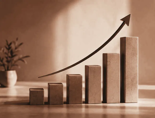 A rising chart with a gold arrow: company growth and higher turnover