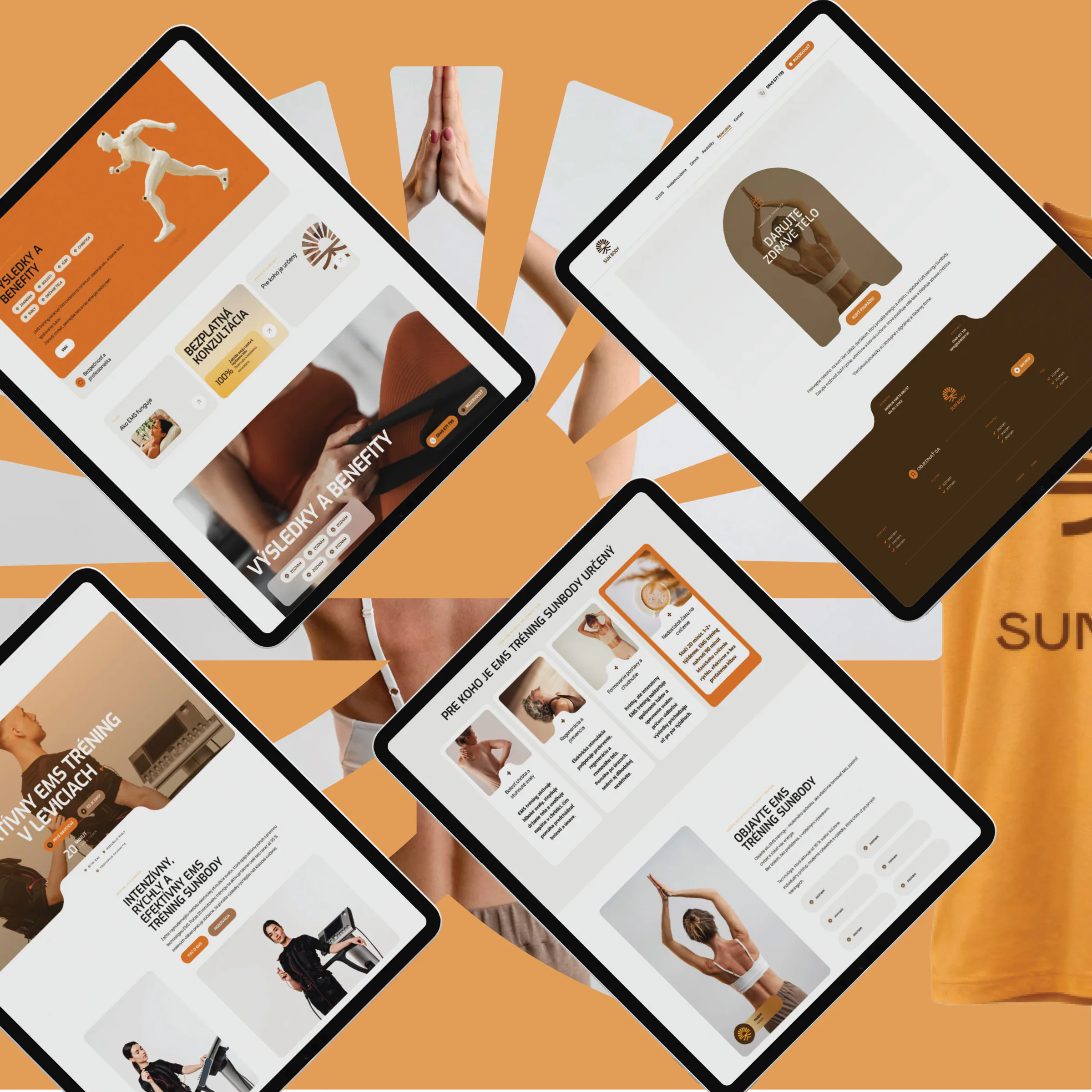 Web SunBody na tabletoch rozložených na oranžovom pozadí